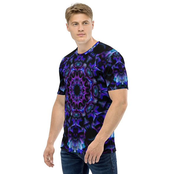 Photograph of a model wearing a unisex Bleace MetaParty Vibes Kaleidoscopic purple, blue, and pink, Trippy Visual tee shirt in the foreground with a white background.  