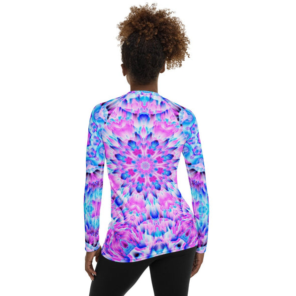 Photograph of a model wearing a unisex Bleace MetaParty Vibes Kaleidoscopic pink, light blue, Trippy Visual Rash guard shirt top.  