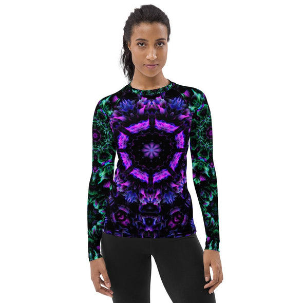 Product Photograph of a unisex Bleace MetaParty Vibes Kaleidoscopic purple, blue, pink, and green Trippy Visual rash guard in the foreground with a white background.