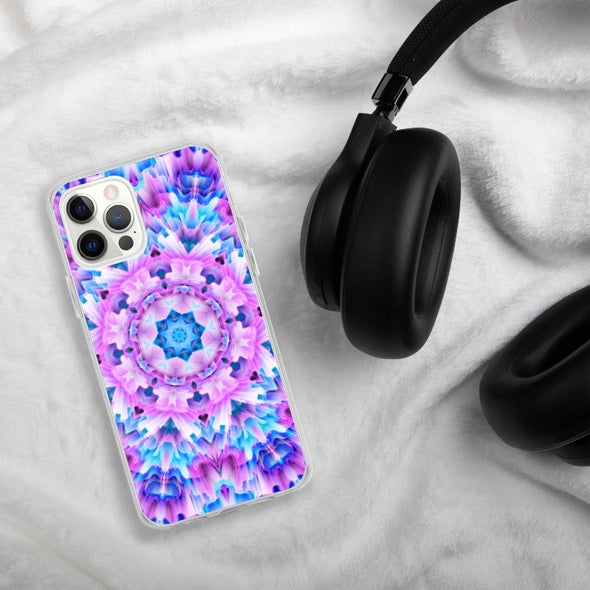 Product photograph of a Bleace Iphone case that has a kaleidoscope image made of pink, blue and purple colors in the foreground against a table backdrop next to a watch and eyeglasses.