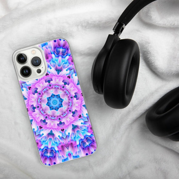 Product photograph of a Bleace Iphone case that has a kaleidoscope image made of pink, blue and purple colors in the foreground against a table backdrop next to a watch and eyeglasses.